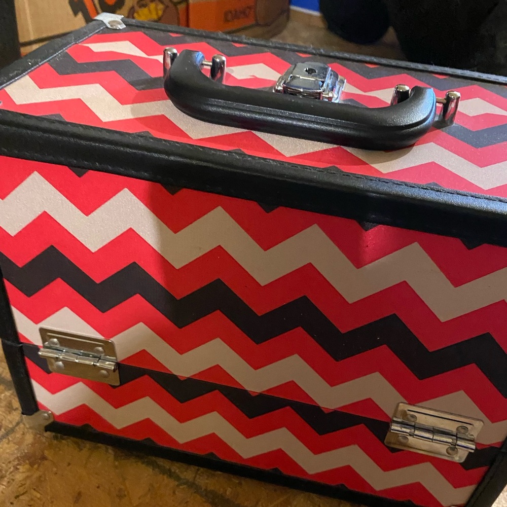 Traveling makeup box. Folds up and locks securely